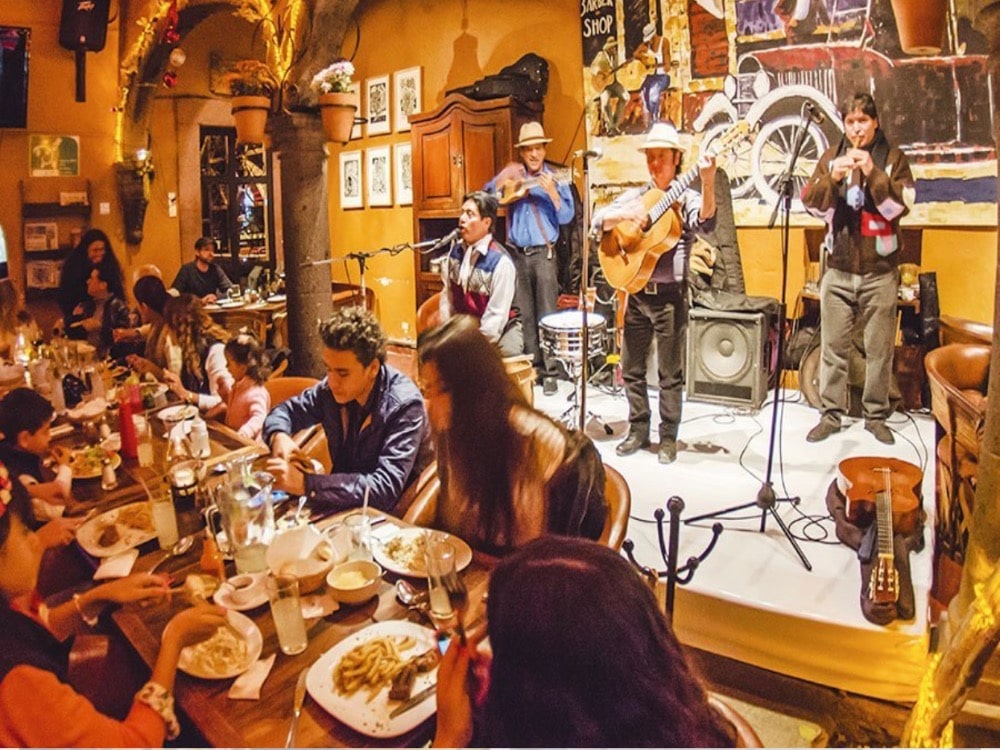 Inside of restaurant Mama Mia with mariachis